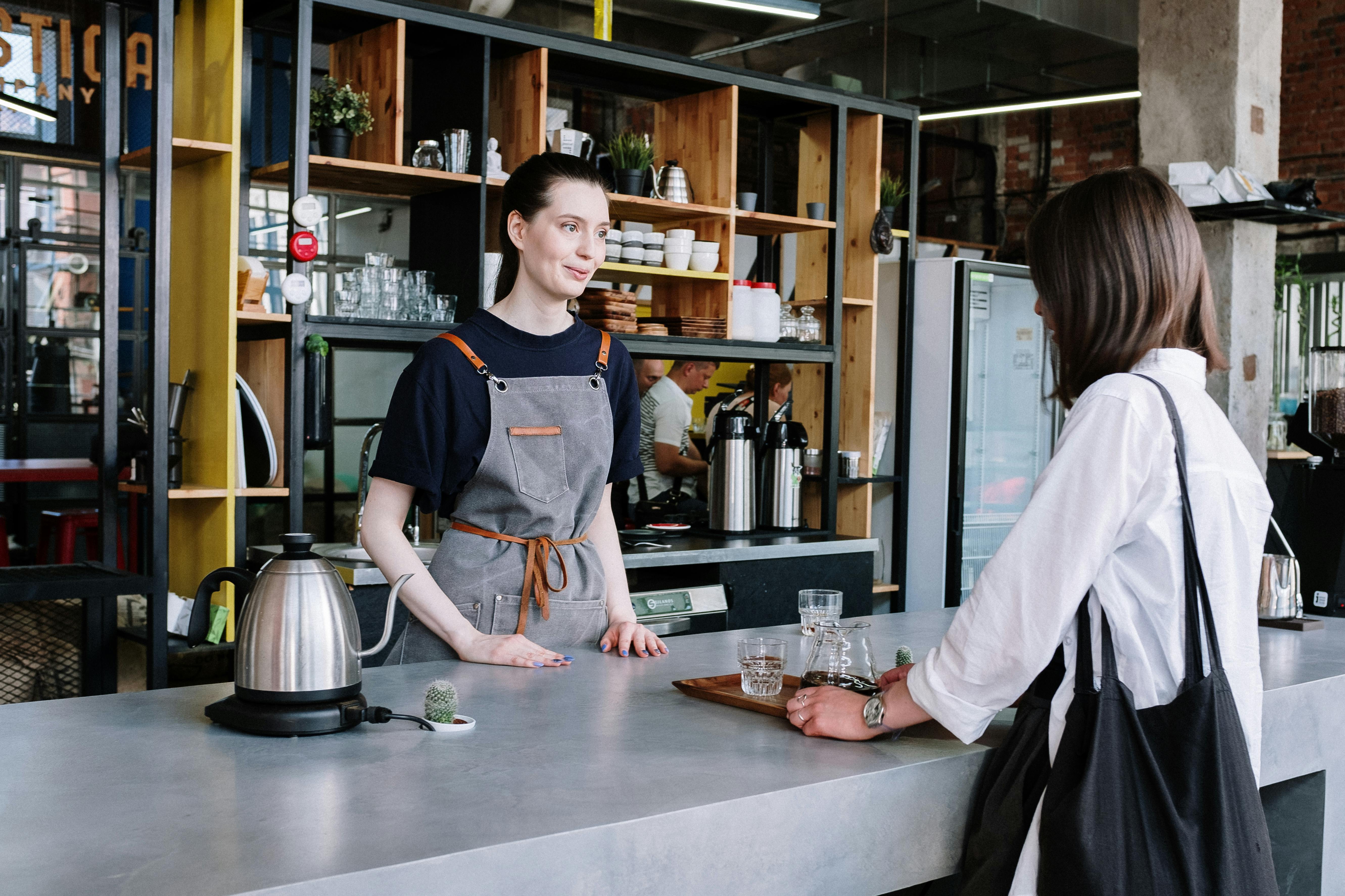 Local business owner helping a customer